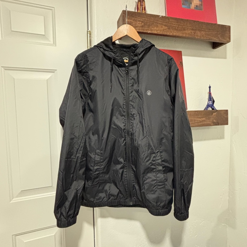Black Volcom windbreaker